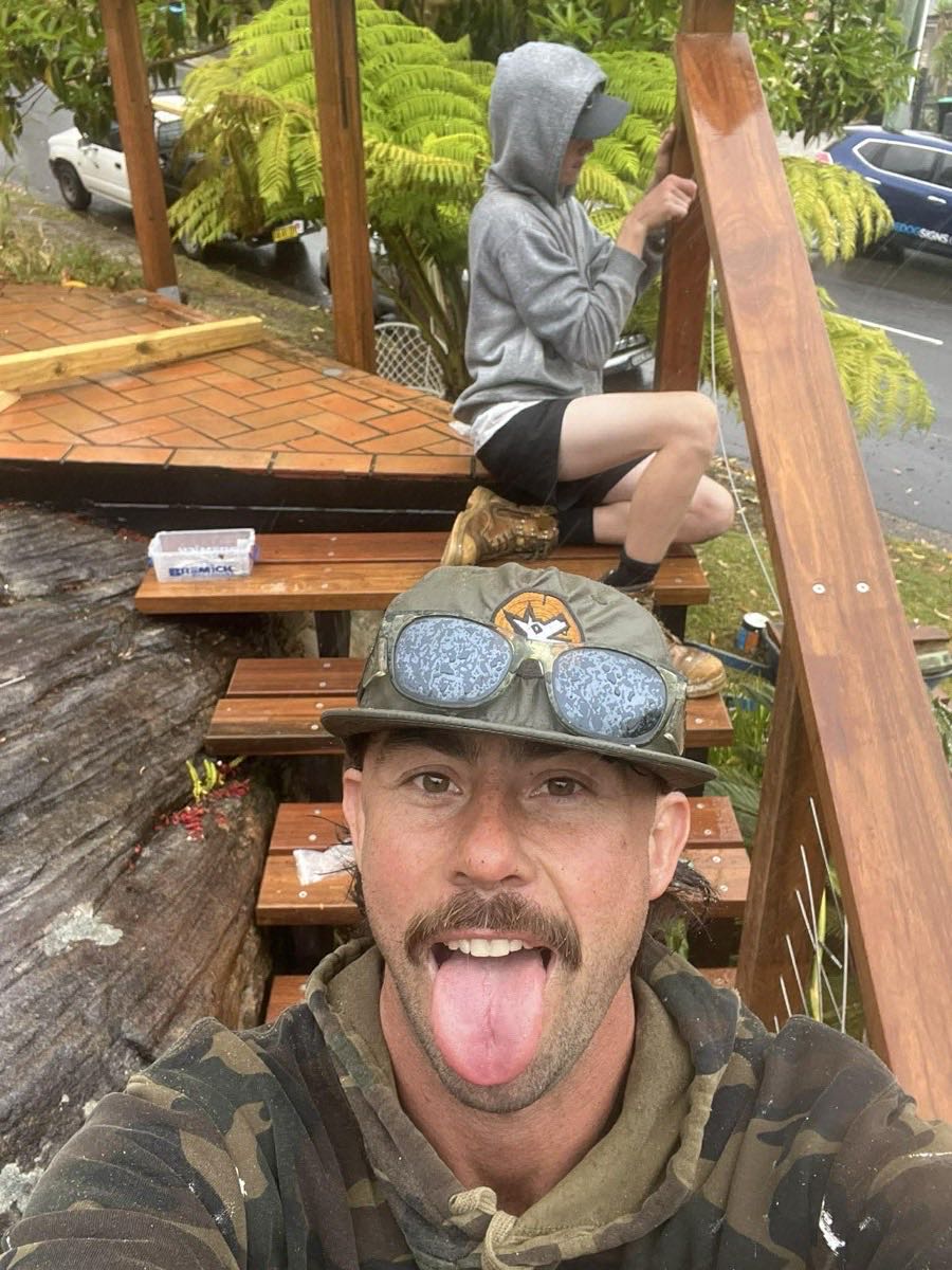 Bark Construction builder on site building timber stairs