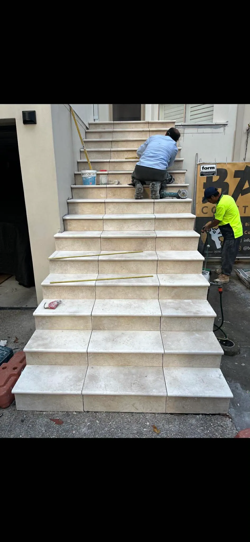 External stone tile staircase being laid at front entry, Northern Beaches