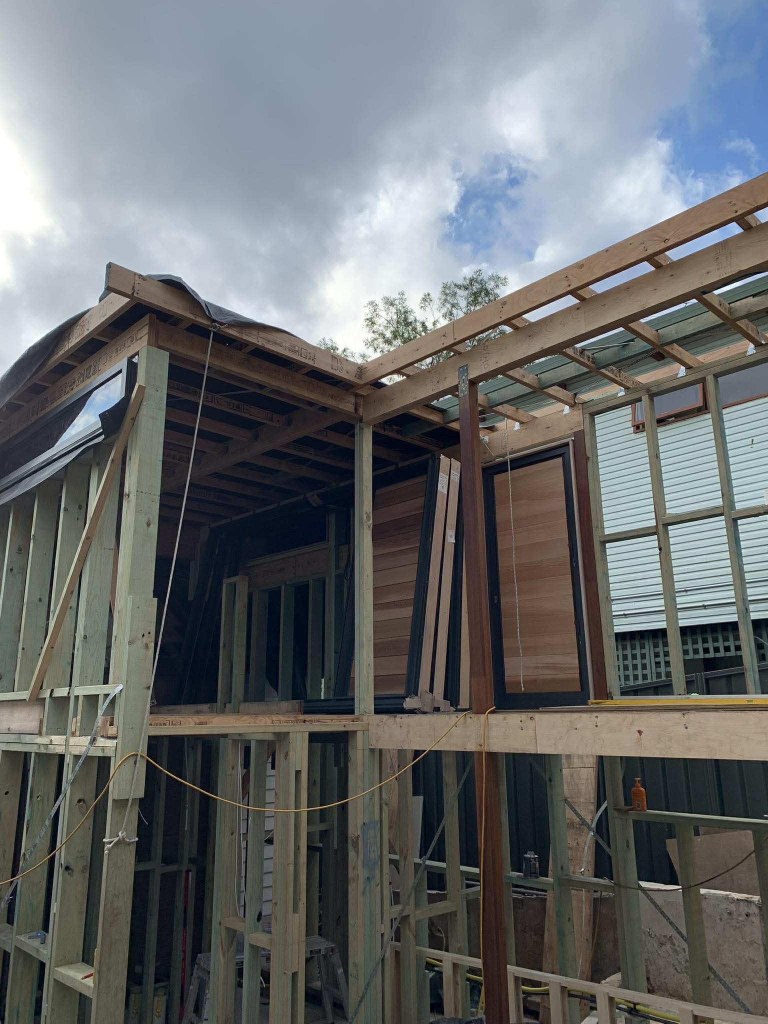 Home extension with structural timber framing and roof rafters